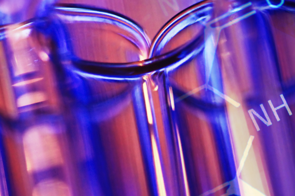 Blue and red photo with stylized test tubes