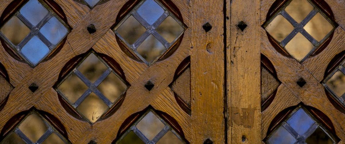 Wooden door with glass insets