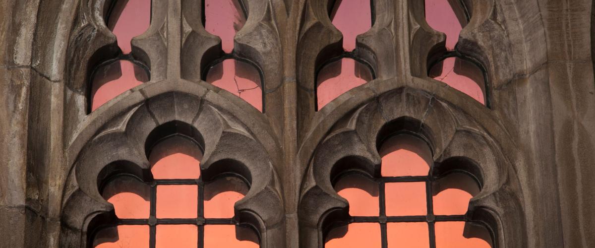 Sunrise reflected in gothic window