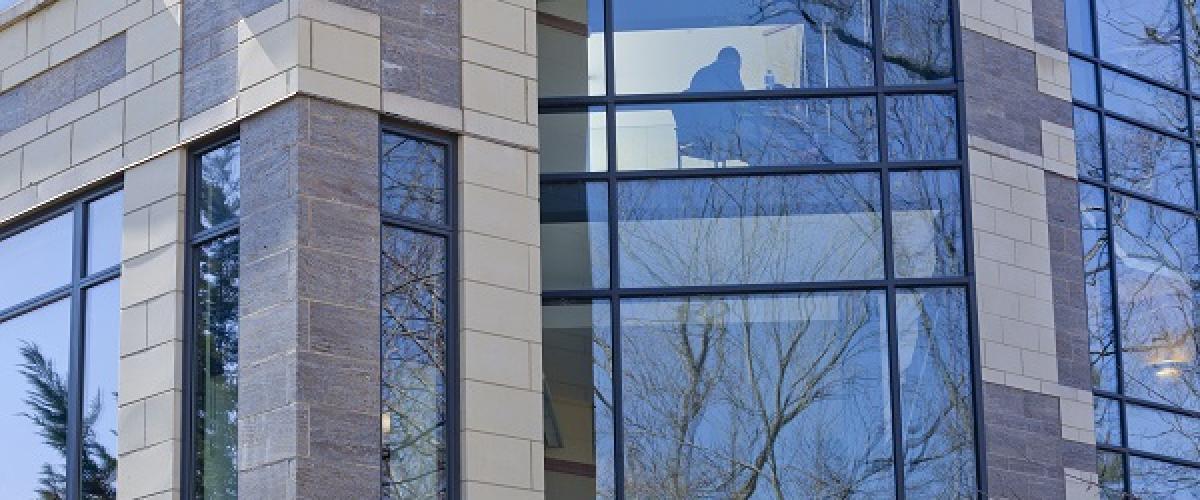 Rubenstein building with trees reflected in windows